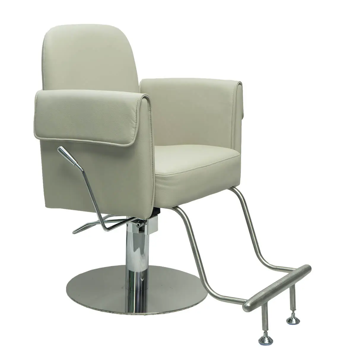 Side angle view of a beige salon styling chair showing thick padded armrests, chrome hydraulic pump, and curved footrest bar